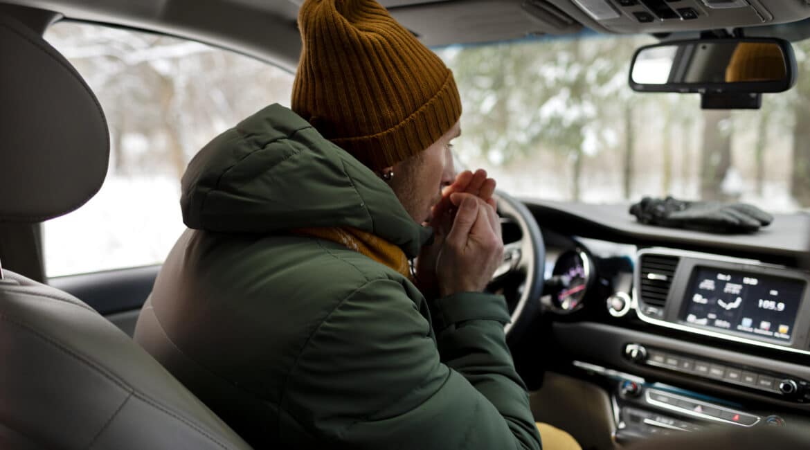 medium shot man driving car