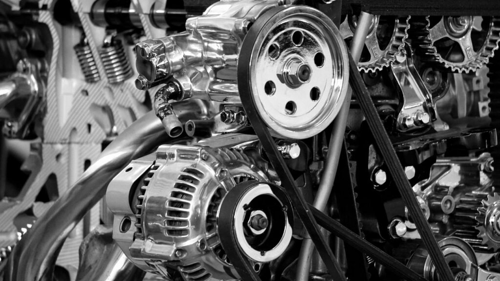 Close-up of a black and white car engine chrome color.