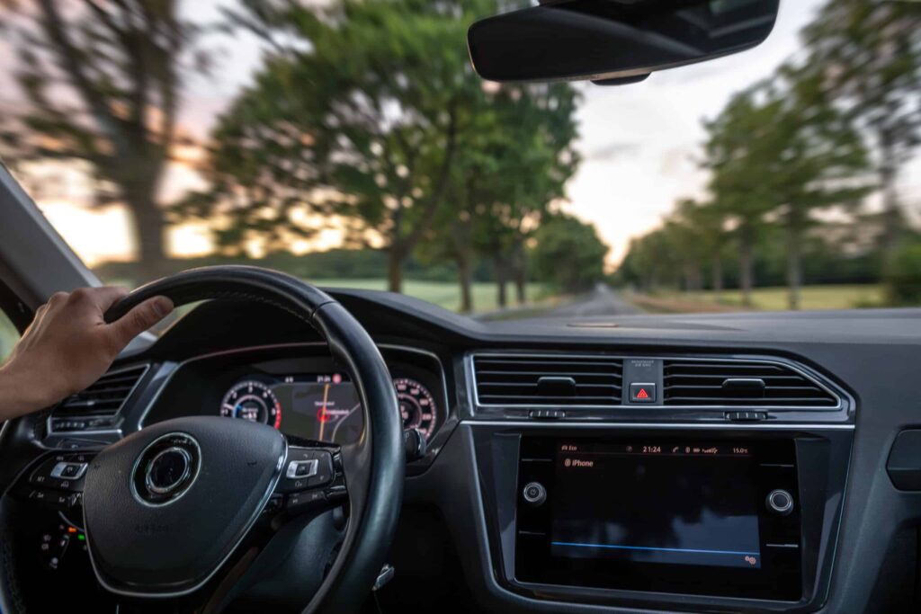 driver view car interior hand steering wheel speed motion 1 scaled 1