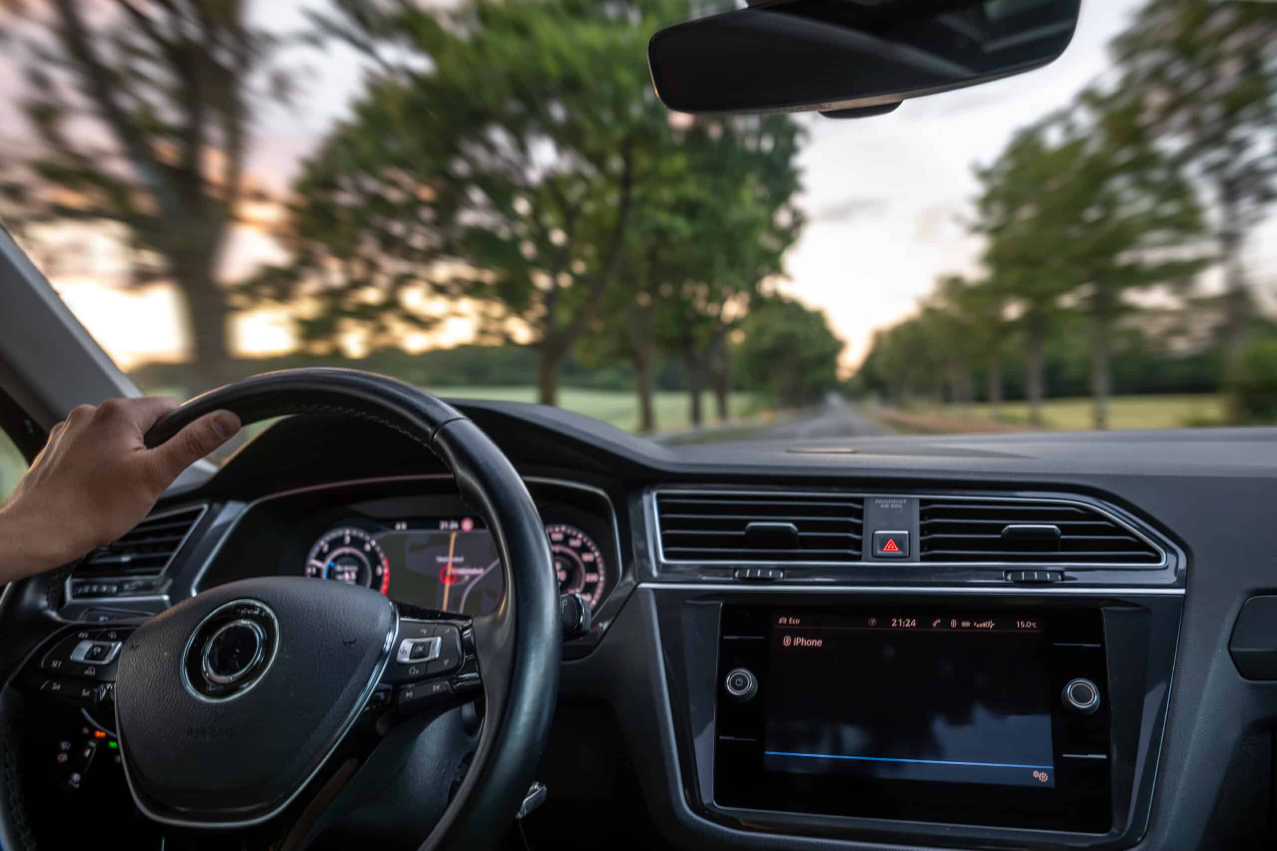 driver view car interior hand steering wheel speed motion 1 scaled 1
