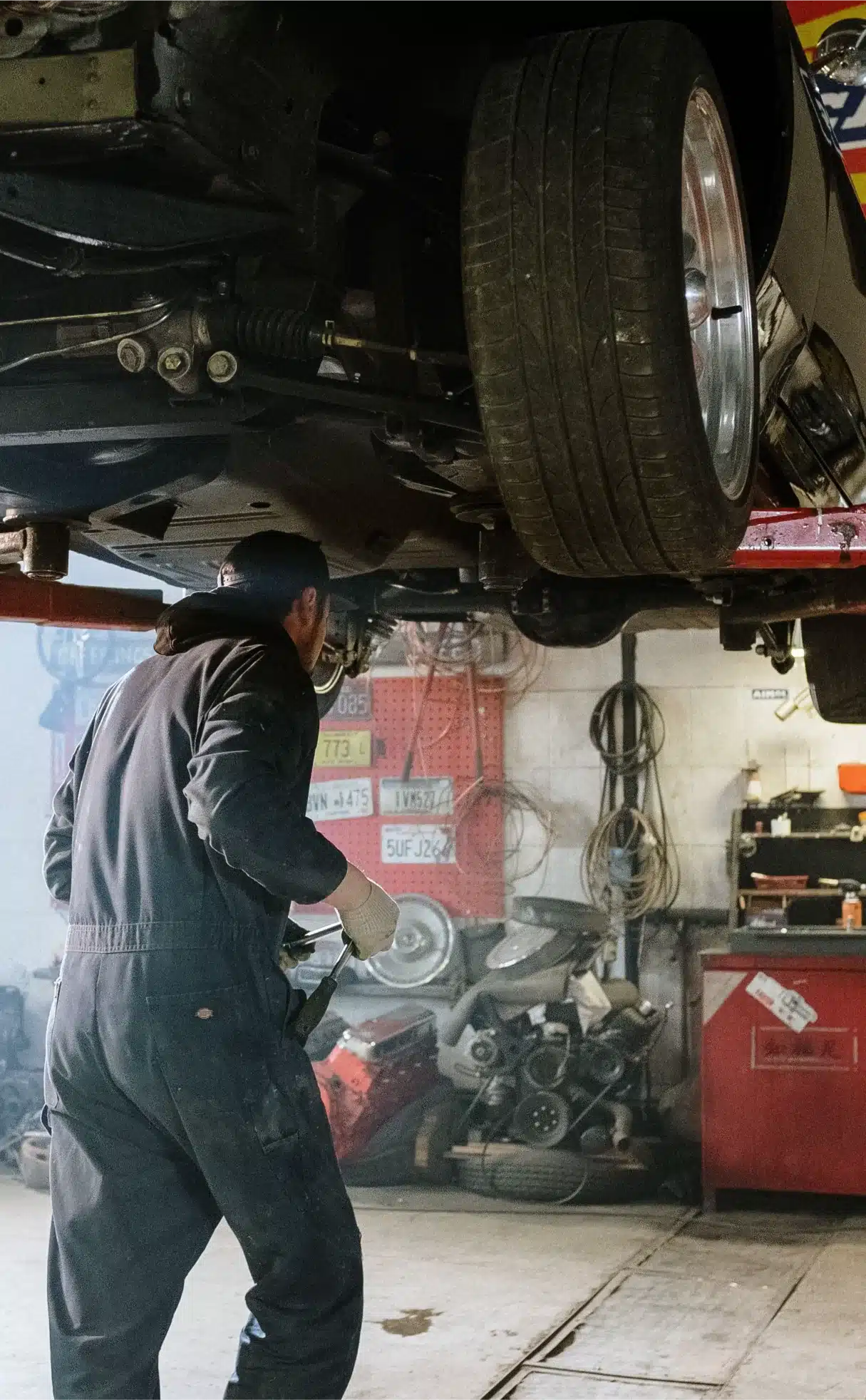 Audi vehicle underside inspection and repair in Bay Shore, NY.